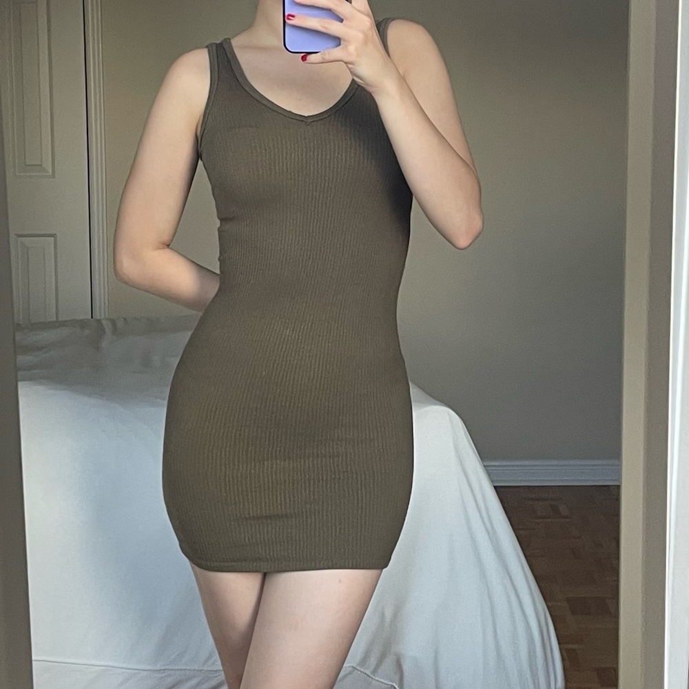 OUT FROM UNDER DREW SEAMLESS SCOUP NECK SLIP DRESS from Urban Outfitters.
